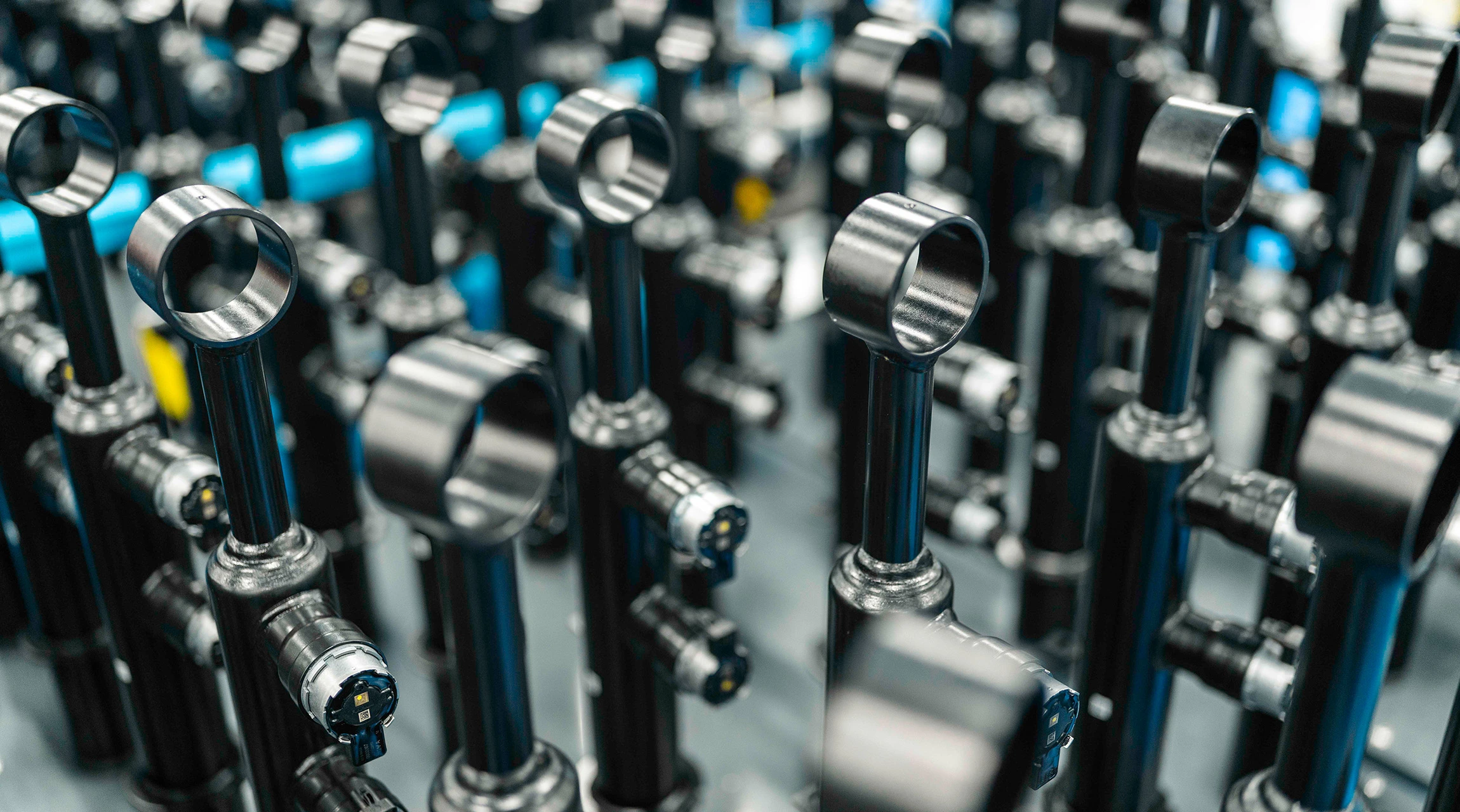BILSTEIN shock absorbers lined up side by side during a production step.